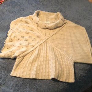 Woman’s Sweater. Short-sleeves.  Could be worn as a vest.